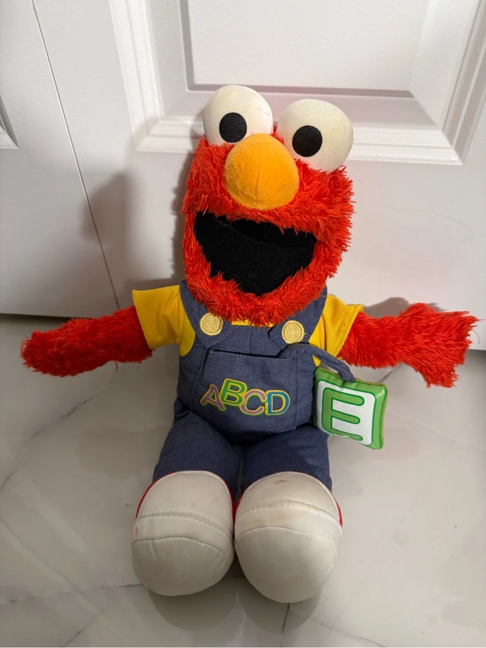 Sesame Street Elmo Plush Toy in Red with ABCD Overalls